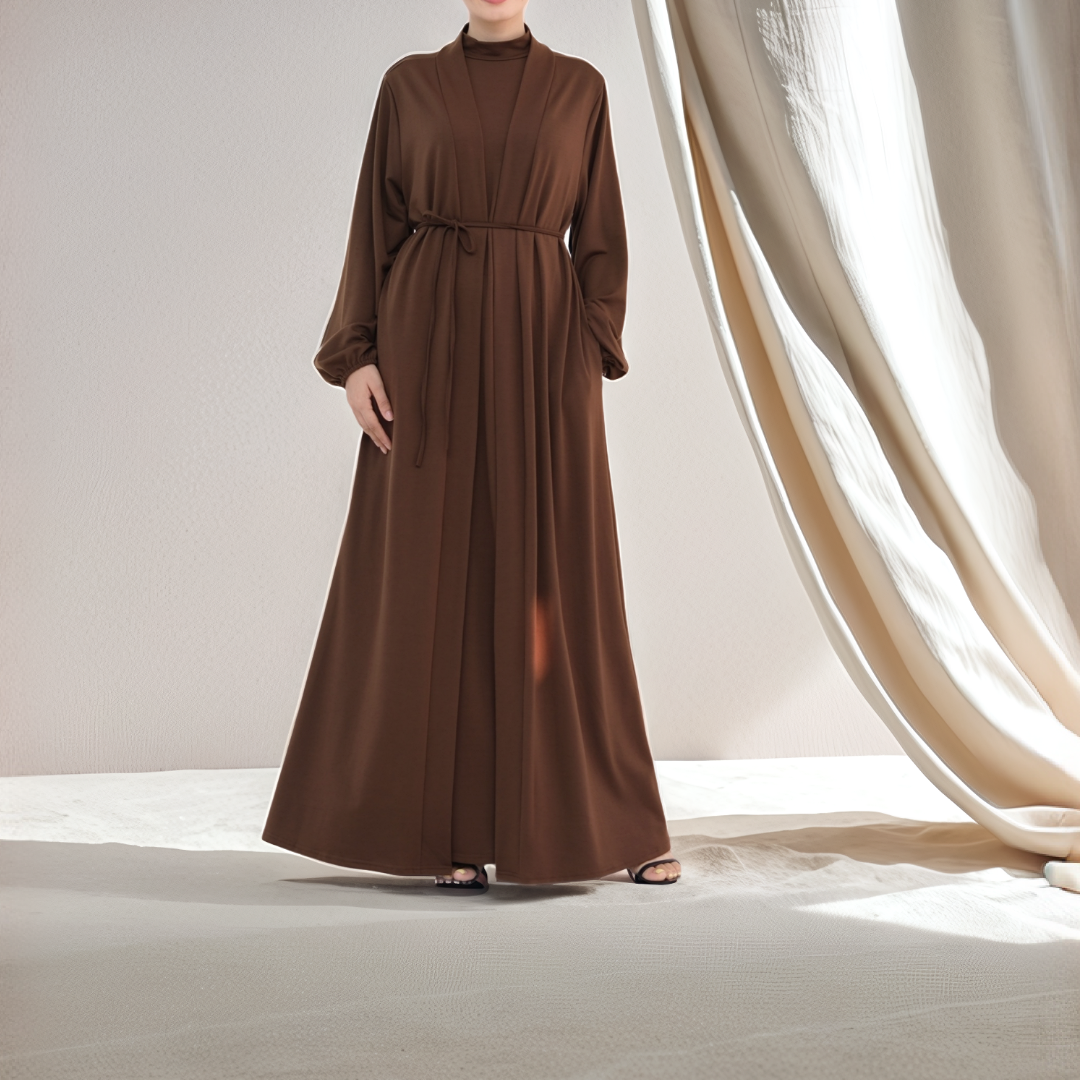 Abaya collection featuring various styles including open-front, belted, and embroidered designs in different colors Immagine