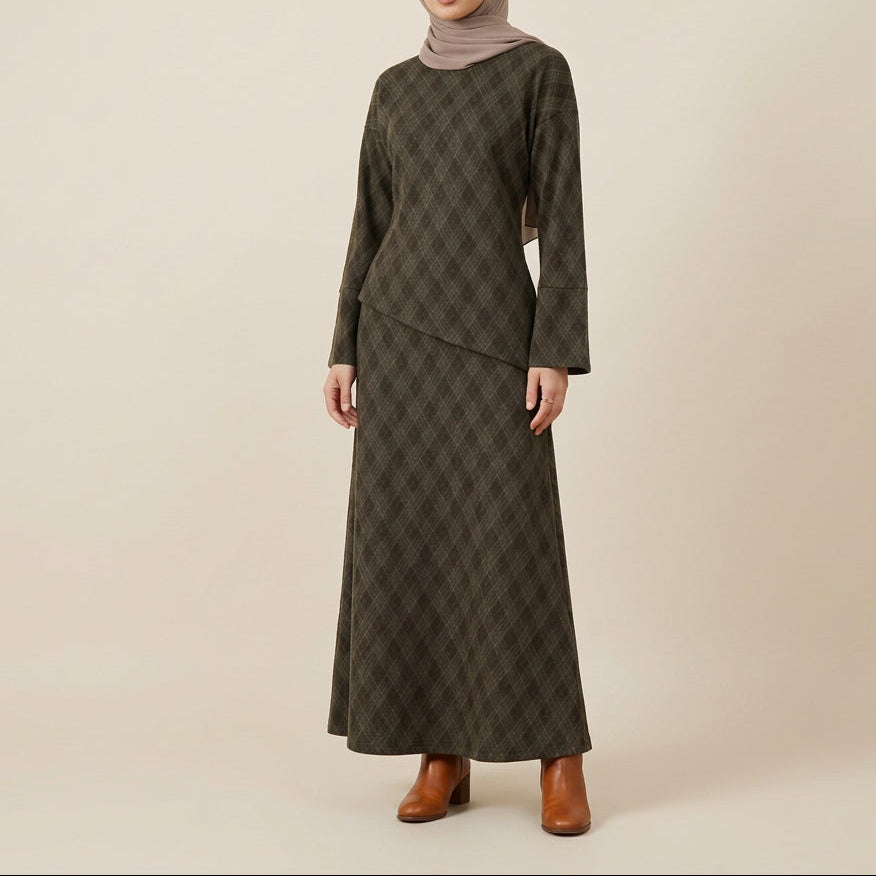 A two-piece long-sleeve dress set in a dark brown and black diamond-patterned fabric, displayed on a mannequin against a white paneled wall.