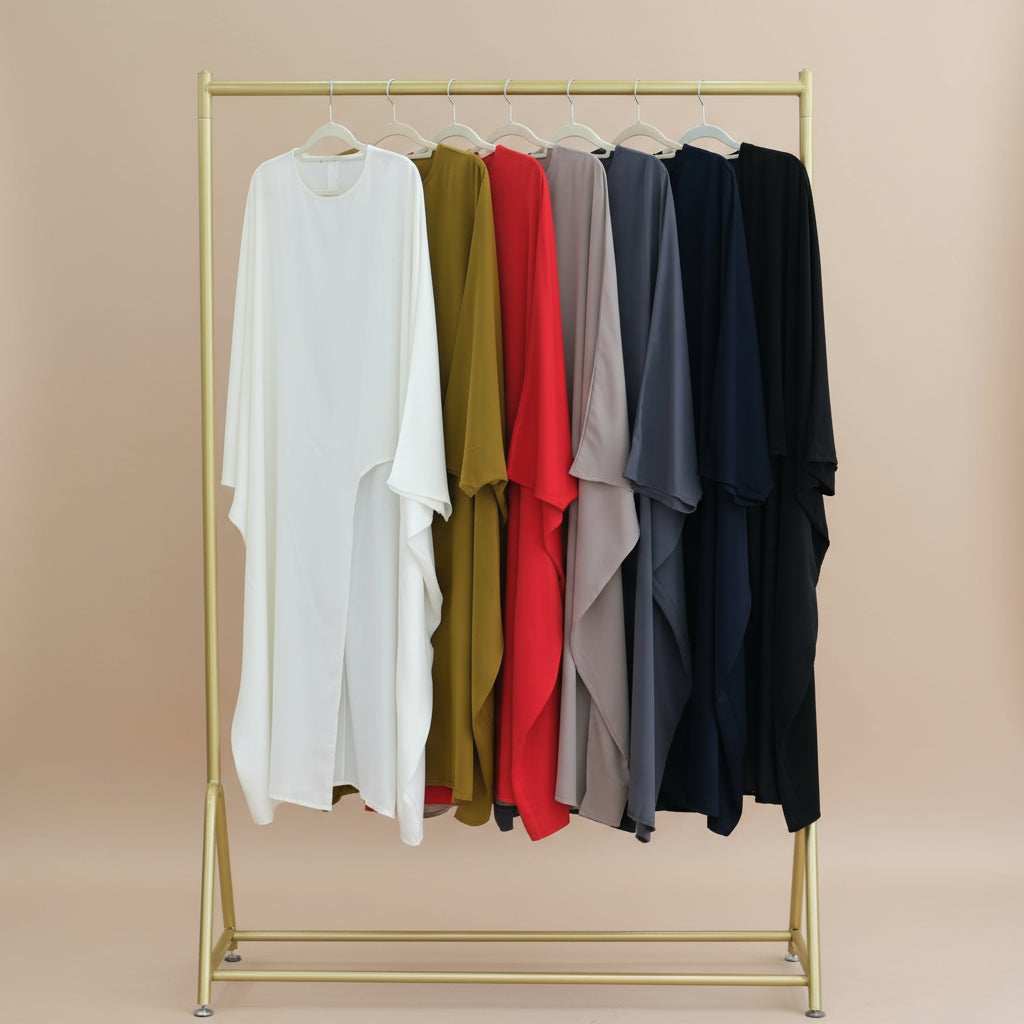 Top tunica oversize asimmetrico da donna | Blusa fluida a maniche lunghe con orlo diviso