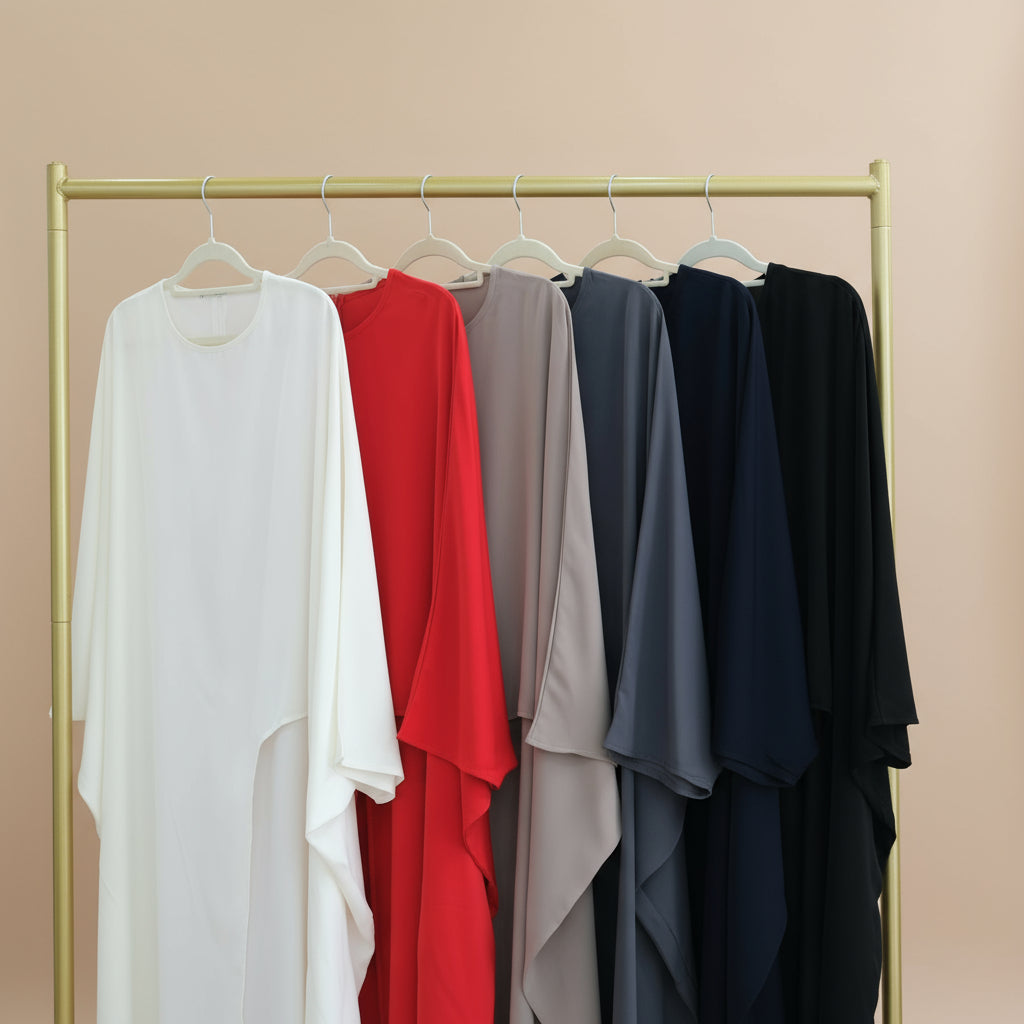 Top tunica oversize asimmetrico da donna | Blusa fluida a maniche lunghe con orlo diviso