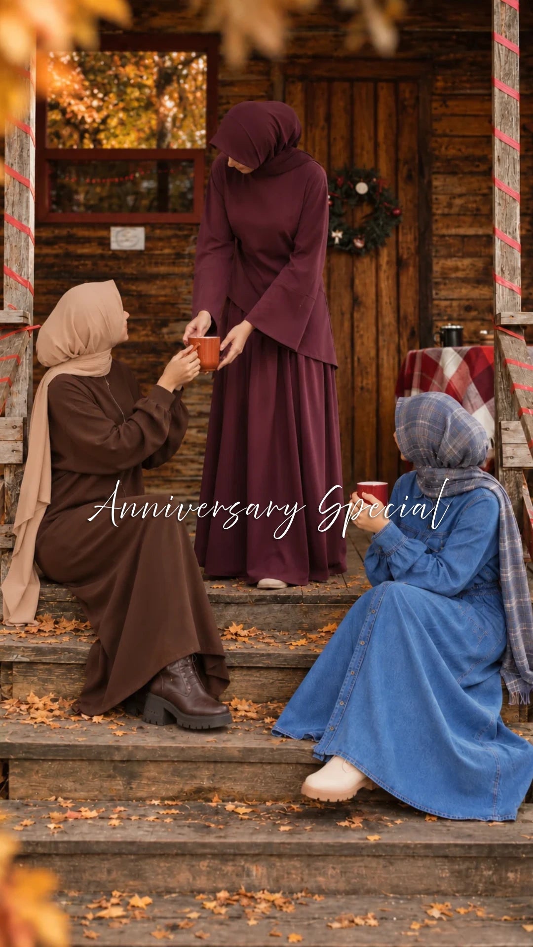 Three hijabi models wearing modest maxi dresses from Try Modest, featuring blue denim abayas and a brown co-ord set in a cozy autumn setting for Anniversary Special Week.