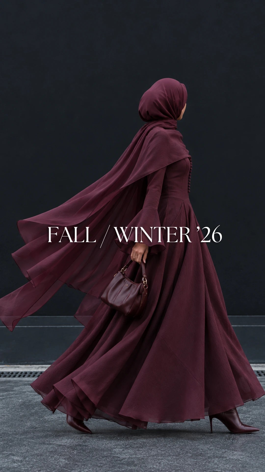 Try Modest Belle burgundy wedding guest maxi dress with elegant flare cuffs and flowing cape, styled with a matching hijab for modest fall occasion wear.