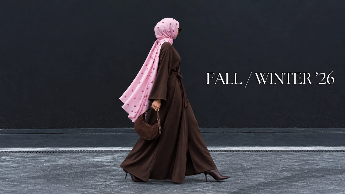 Try Modest autumn winter modest fashion featuring a chocolate brown maxi abaya styled with a flowing pink printed modal hijab, leather handbag and ankle boots.